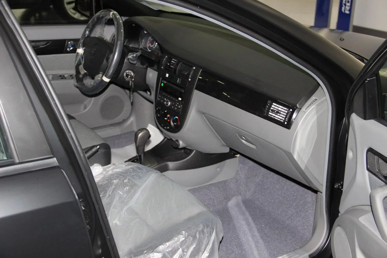 Lacetti матового черного цвета в топовой комплектации Lacetti матового черного цвета в топовой комплектации